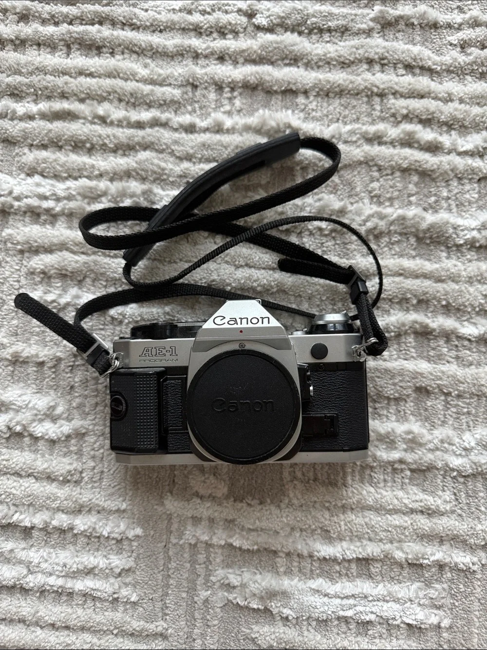 Canon AE-1 Film Camera in Silver and Black with Strap